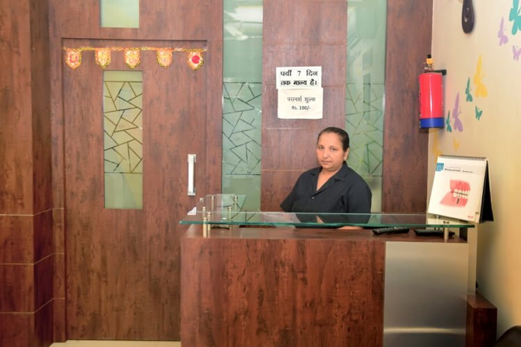 Comfortable reception desk and patient waiting lounge at Model Town Hisar